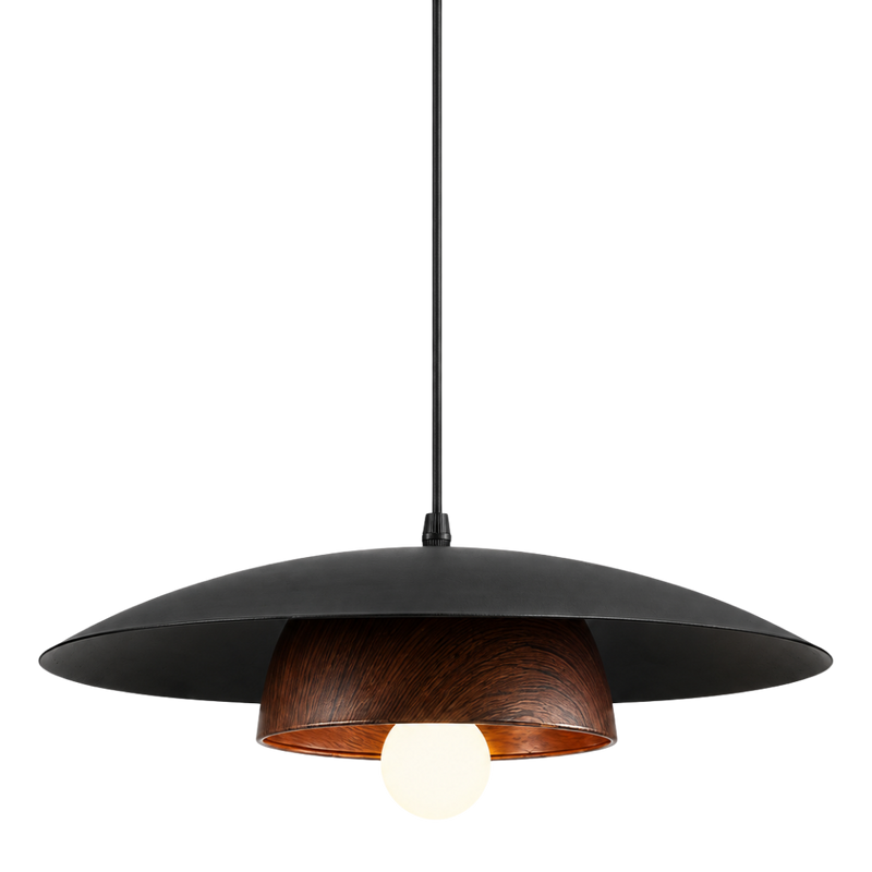 A modern pendant light with a wide, shallow black metal shade, a warm brown wood-grain interior, and a glowing white bulb, suspended by a black cord against a solid white background.
