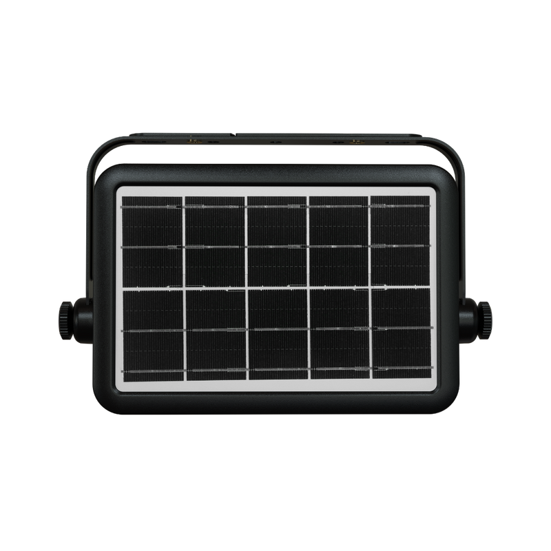A rectangular solar-powered light fixture with a black housing, a silver border around the front panel, and a black solar panel grid, shown on a solid white background.