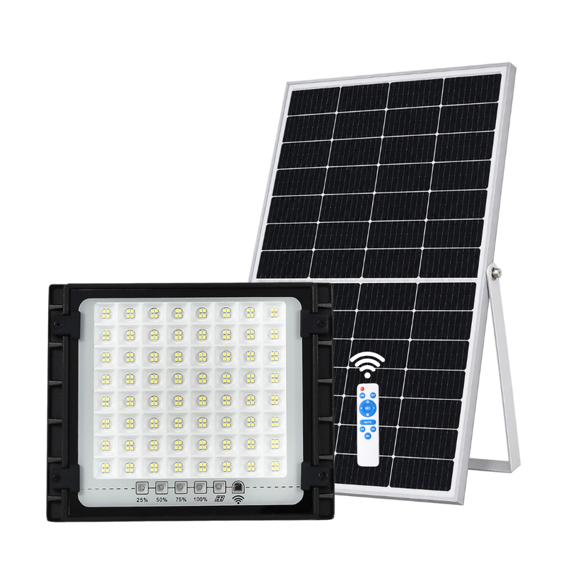 A solar-powered LED light fixture shown with its rectangular solar panel, white remote control, and black metal housing on a plain white background.
