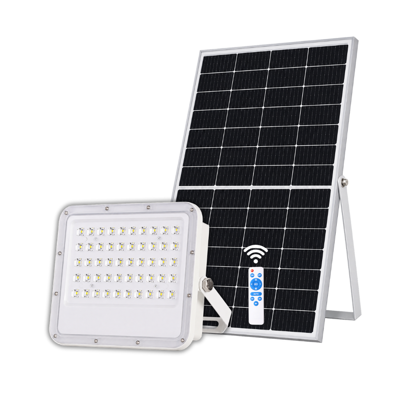 A white rectangular solar-powered LED floodlight with a silver frame, shown in front of a black solar panel with a silver mounting frame on a white background.