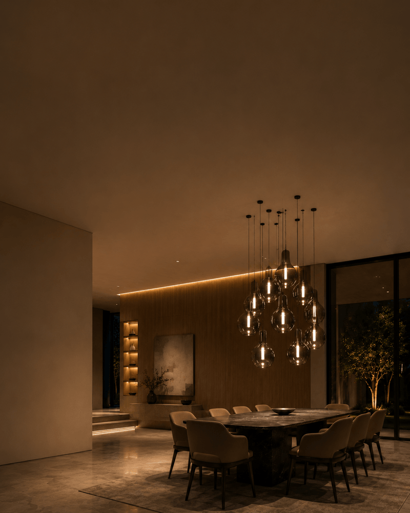 Modern dining room with a chandelier and dim lighting